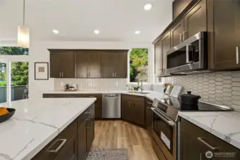 Modern kitchen with large island and Bosch Appliances.