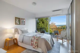 Natural light fills the primary suite.