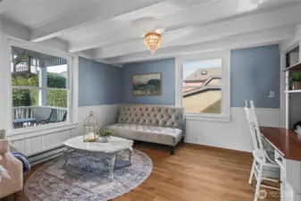 Both front rooms offer flexible space. Set up an office, lounge area, or library overlooking the covered porch and garden.