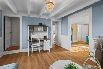Take the hall to the dining room, or the step up to the stairwell to visit the second floor.