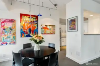 Dining area with great art wall!