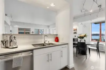 Bosch Dishwasher, GE Profile Range, Fisher & Paykel Refrigerator