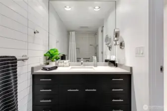 Modern bath with sleek vanity, contemporary fixtures, and clean tile finishes.