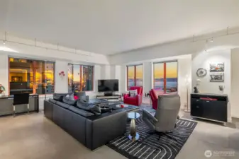 Tile flooring throughout living, dining, hall and kitchen.