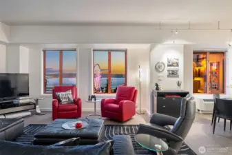 Wide living room layout creates multiple seating areas within the great room.