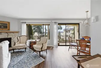 Nice open living room to dining with access to lovely covered balcony with storage.