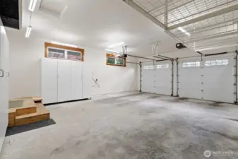 Spacious two-car garage with electric car charging outlet.