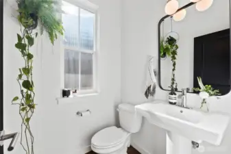 Downstairs powder room. 1/2 bath.