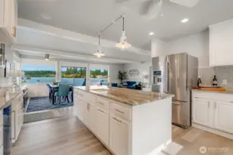 Water views frame the kitchen, making everyday moments feel extraordinary.Front-row waterfront livin