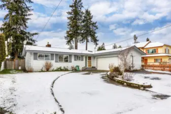 Cute home on quiet street w/ large driveway to 2 car garage