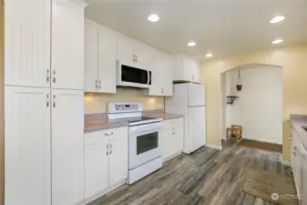 Pantry cabinets & view back to entry hallway