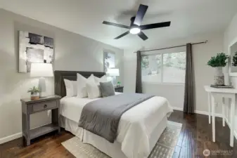 The spacious Primary Bedroom Suite includes a private bath and walk-in closet.