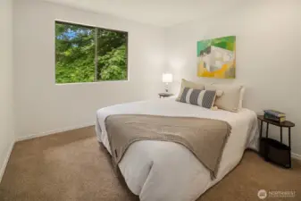 2nd bedroom gets filtered afternoon sunlight, overlooking the backyard.