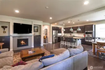 Great room concept living with open living room, kitchen and dining areas.