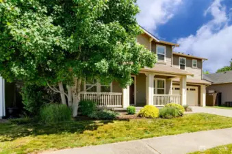 Inviting covered front porch.  Walking distance to community playgrounds and park.