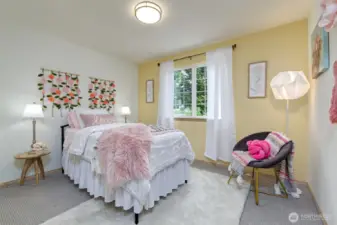 Light and bright guest bedroom.