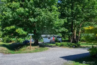 Expansive, corner lot with room for 2 car garage or carport.