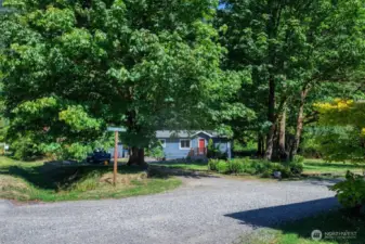 Expansive, corner lot with room for 2 car garage or carport.