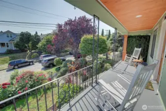 Take in the neighborhood from your covered porch!