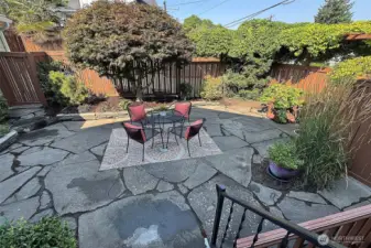 Gorgeous flagstone patio is just off kitchen