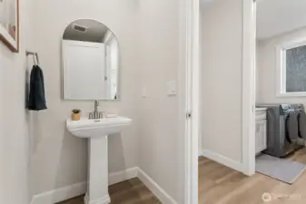Conveniently located away from the main living area, this main floor half bath is both elegant and functional.
