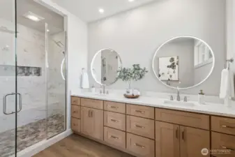 Sleek and functional, the illuminated bathroom mirror adds a touch of luxury while providing perfect lighting for daily routines. The built-in anti-fog feature ensures a clear reflection at all times, combining modern convenience with sophisticated style.
