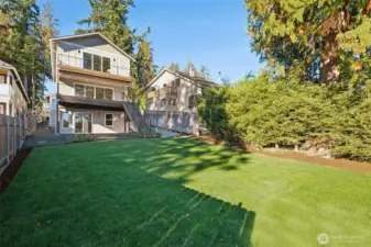 The grounds are thoughtfully designed to enhance the natural surroundings. Lush grass, mature greenery and soft plantings provide color, texture, and year-round enjoyment. Three decks provide additional outdoor spaces to relax and enjoy or entertain.