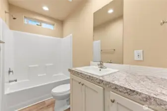 Guest bathroom off the hallway and in between guest bed 1 and 2