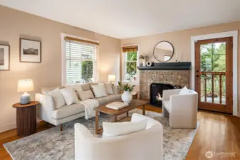 Large living room with access to outdoor deck