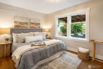 Main floor bedroom looks out over the private garden