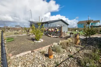 With beachy, low maintenance landscape, you can enjoy your yard without all the work!