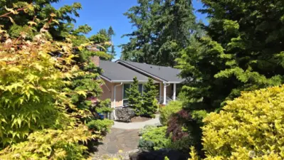 Peek a boo view of the house from the Japanese inspired gardens in front