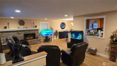 Open floor plan with cozy fireplace in the living room