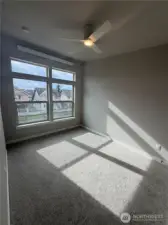 Subject property. Main bedroom flooded with natural light