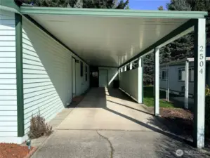 Now back at the front of the home, a view of the carport.