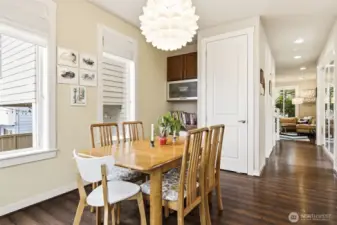 Space saving built-in desk and tech garage allows for easy storage and work area.