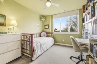 Spacious bedroom with Seattle skyline views.
