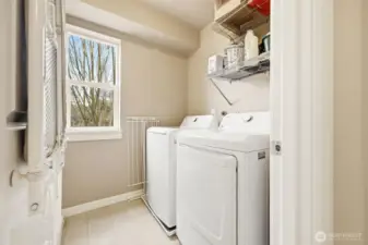 Laundry room conveniently located between bedrooms on second floor.