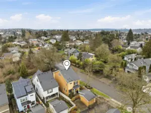 Seattle skyline views from bedroom of this well laid out home on corner lot.