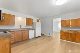 All new LVP flooring. Large kitchen with room for island