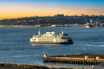 Beautiful views of Elliott Bay with ferry, shipping, air and foot traffic all around!