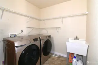 utility room next to garage entry door