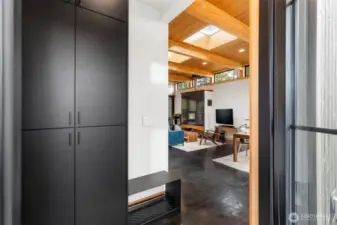This dramatic entry sets the tone for a special experience! Built-in entry closets for your convenience keeps everything organized.