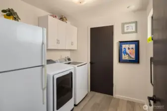 New Washer and Dryer and a powder room is conveniently located off the kitchen space.