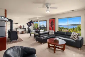 Lower level has a view and cozy fireplace.