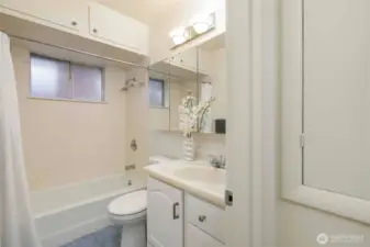 Updated full bathroom on the main level featuring clean finishes and easy access from both bedrooms—bright, functional, and move-in ready.