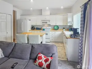 View of family room to kitchen.  Lots of space in this townhome!