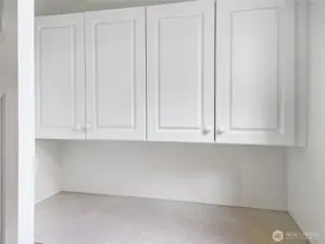 Additional storage in the laundry area.