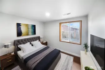 This bright and inviting bedroom pairs perfectly with the home’s fresh finishes. *virtually staged*
