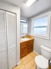 The primary bedroom includes its own full private ensuite bathroom, offering convenience and a personal space to unwind.